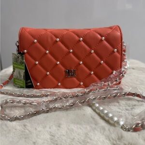 New Badgley Mischka Peach Quilted Crossbody Bag. Small defect see last pic.